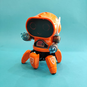 ربات کنترلی شش پا موزیکال و رقصنده نارنجی Dancing ROBOT on remote control RC music light orange -اسباب بازی